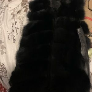 Black furry mink an leather vest